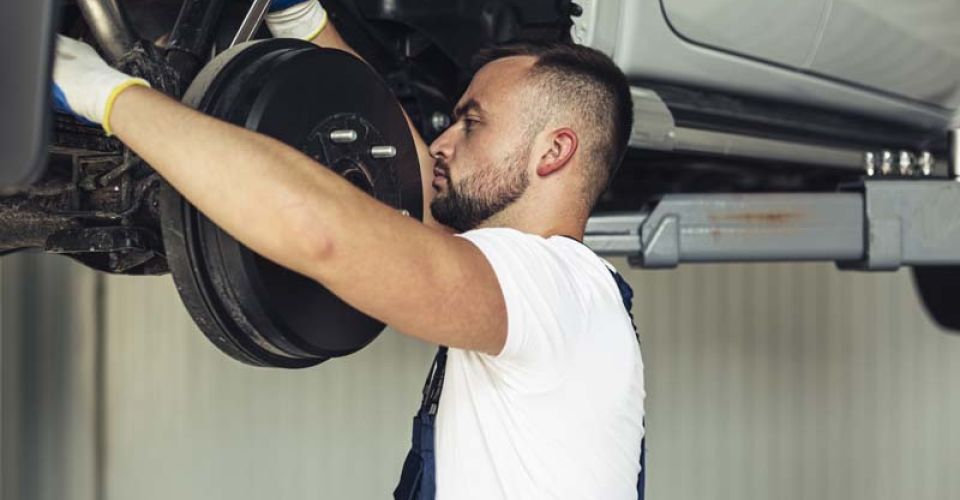 man srepairing vehicle